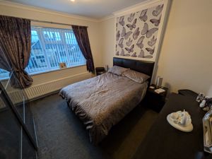 Bedroom One- click for photo gallery
